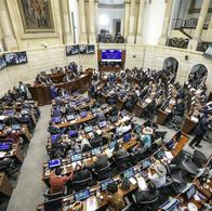 A general view shows the Colombian Senate during the debate on the recreational use of marijuana for adults, in the plenary hall of the congress of the republic at Bogota, on June 20, 2023. The Colombian Congress is discussing a constitutional reform that seeks to legalize the production and commercialization of cannabis for adults. (Photo by Juan Pablo Pino / AFP)