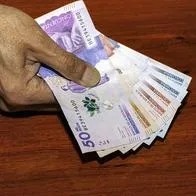 Aterrizan trabajadores en Colombia con propuesta de nuevo salario mínimo