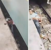 Padre se lanza a las vías para salvar a su bebé mientras tren les pasa por encima: quedó en video
