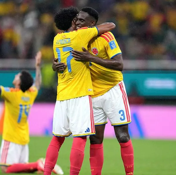 Jhon Lucumí y Johan Mojica