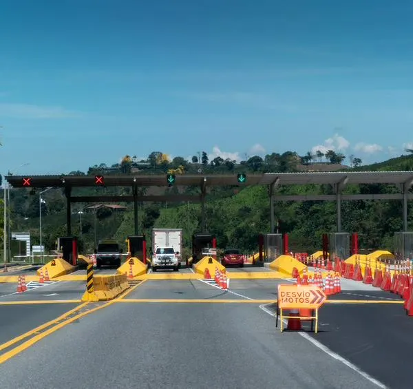 Toll road with mountains background. Caldas department. Colombia.