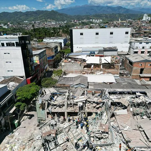 PEREIRA, COLOMBIA - AUGUST 10: Residents and rescue workers carry out search, rescue and evacuation operations after a powerful earthquake struck Colombia, killing at least 18 people and causing widespread damage in Pereira, on August 10, 2026 in Pereira, Colombia. Preliminary reports indicate that several structures collapsed, buildings and roads were damaged, and some public services were temporarily disrupted. Hospitals activated emergency plans to treat the injured, while technical teams began assessing damaged buildings as authorities warned residents to avoid unsafe structures and remain alert for aftershocks. (Photo by Alexis Munera/Anadolu via Getty Images)