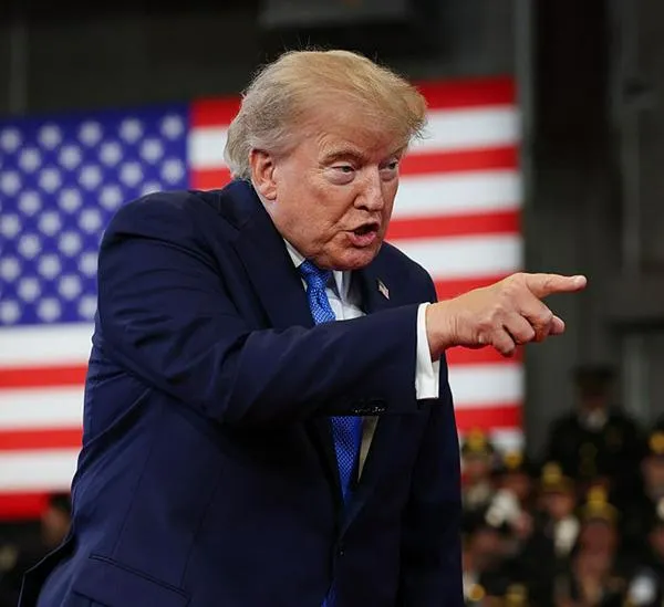 GARDEN CITY, NEW YORK - AUGUST 14: U.S. President Donald Trump arrives to deliver remarks at the David S. Mack Center for Training and Intelligence on August 14, 2026 in Garden City, New York. President Trump visited the police academy to highlight the FBI's 2025 Crime Statistics Report and rally support for local Republican candidates ahead of the upcoming midterm elections. (Photo by Samuel Corum/Getty Images)