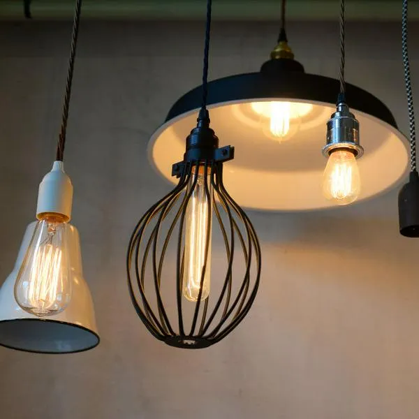 Ceiling lamps and lightbulbs from the British brand Marke Dyke & Dean are for sale in the 'Hallesches Haus,' a shop for lifestyle, interior and design products with a cafe in the district of Kreuzberg in Berlin, Germany, 05 April 2016. Photo:  Jens Kalaene/dpa | usage worldwide   (Photo by Jens Kalaene/picture alliance via Getty Images)