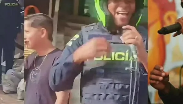 ¿Quién es el policía que sorprendió al cantar ‘Sin sentimiento’, del Grupo Niche, junto a un artista callejero?