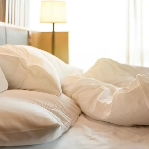 Morning sunshine on the bed through the window