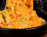 Papas chorreadas con queso, tres sabores que saben a Colombia