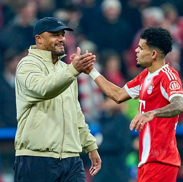 Vincent Kompany y Luis Díaz