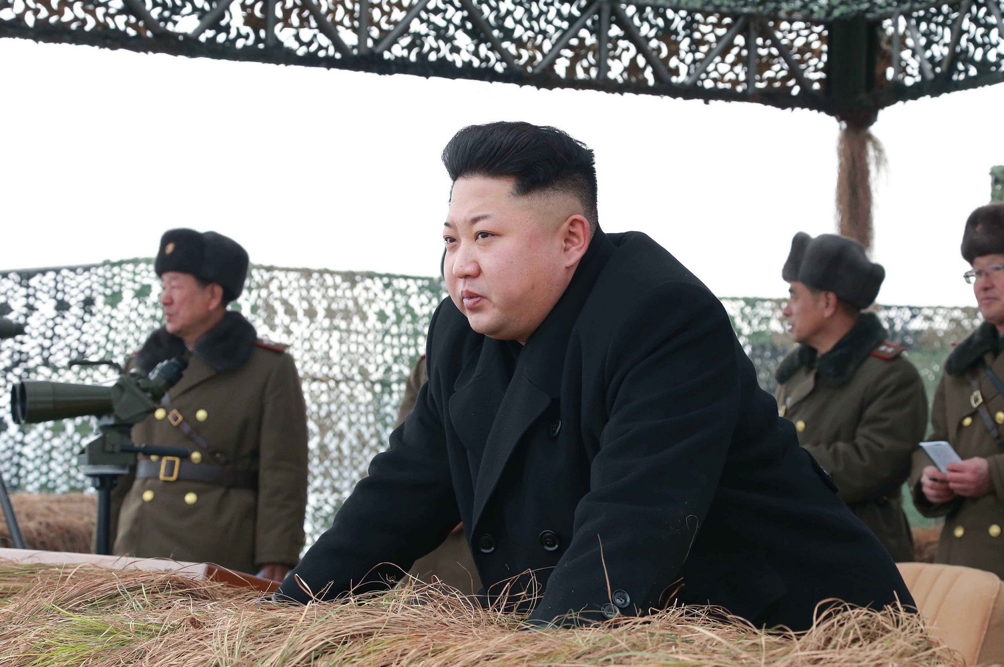 This undated picture released from North Korea's official Korean Central News Agencdy (KCNA) on January 27, 2015 shows North Korean leader Kim Jong-Un (C) inspecting a winter river-crossing attack drill of the armored infantry sub-units of the motorized strike group in the western sector of the front of the Korean People's Army (KPA) at undisclosed place in North Korea.   AFP PHOTO / KCNA via KNS    REPUBLIC OF KOREA OUT  --- THIS PICTURE WAS MADE AVAILABLE BY A THIRD PARTY  ----- AFP CAN NOT INDEPENDENTLY VERIFY THE AUTHENTICITY, LOCATION, DATE AND CONTENT OF THIS IMAGE  ----  THIS PHOTO IS DISTRIBUTED EXACTLY AS RECEIVED BY AFP    ---EDITORS NOTE--- RESTRICTED TO EDITORIAL USE - MANDATORY CREDIT "AFP PHOTO / KCNA VIA KNS" - NO MARKETING NO ADVERTISING CAMPAIGNS - DISTRIBUTED AS A SERVICE TO CLIENTS