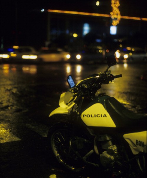 COLOMBIA - CIRCA 1900:  Police Motorbike in the Streets at Night, in Bogota, Colombia.  (Photo by Veronique DURRUTY/Gamma-Rapho via Getty Images)